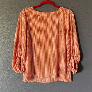 Ladies orange patterned blouse
